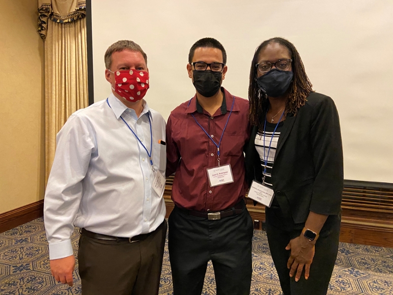 Doctor Katz, Juan Rodriguez, and Doctor Arriola pose for a photo