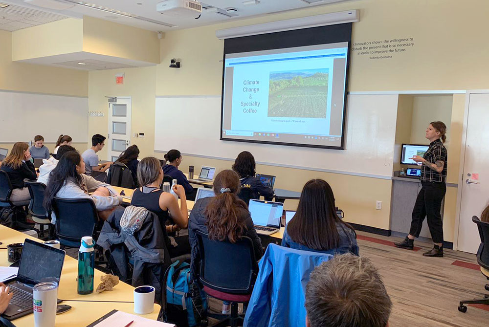 Students viewing slides of Climate Chang and Specialty Coffee